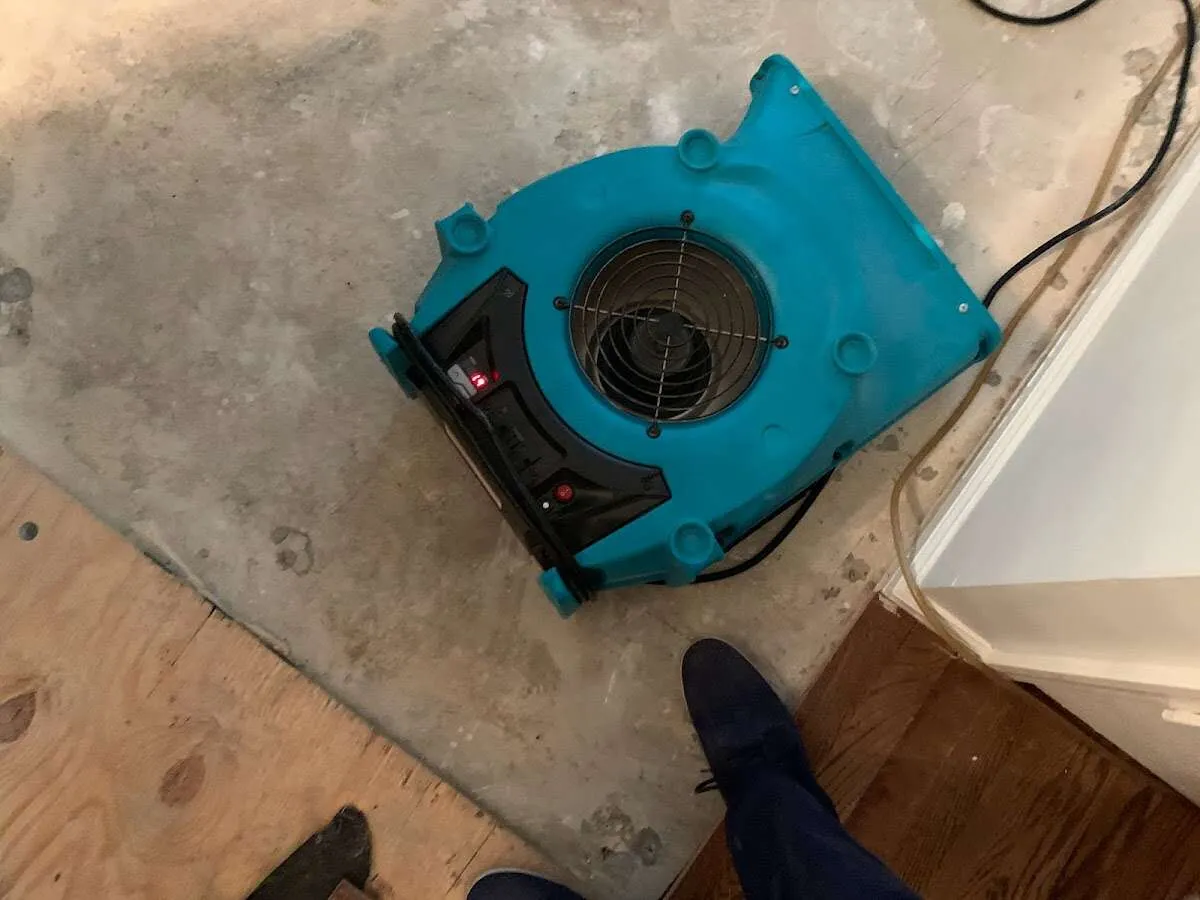 Air mover drying subfloor during Leak Detection & Repair in American Canyon